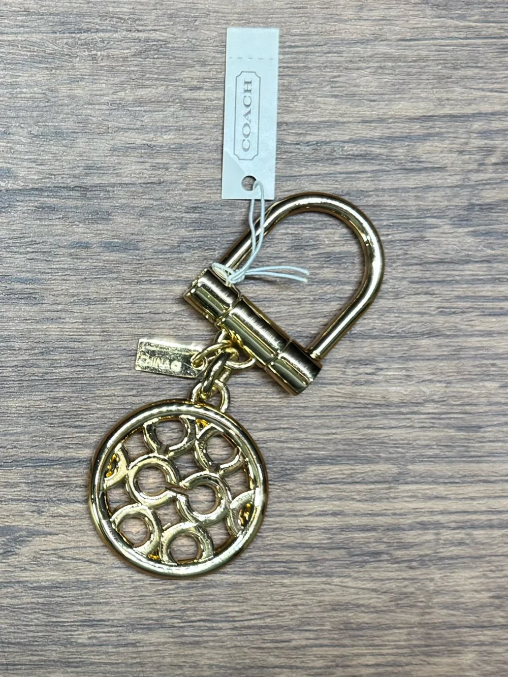 Coach Gold Tone Signature Logo Circle Keychain Bag Charm